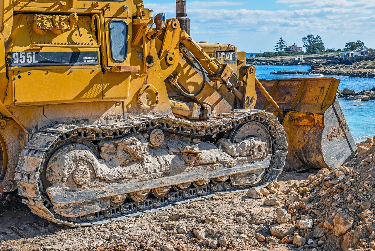 Bulldozer, dozer loader, gravel pit — Why Quality Construction Cement Matters for Safety